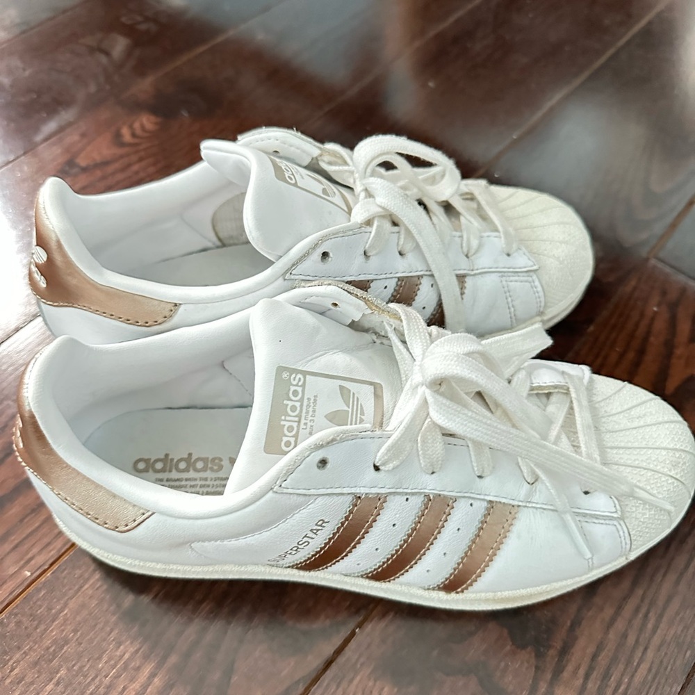 Adidas superstar white and gold sneakers